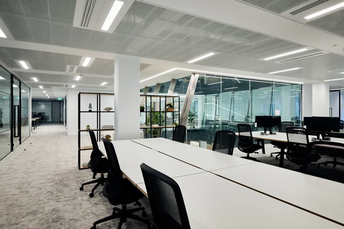 Open plan office floor at 10 Old Bailey with desks and full height glazing