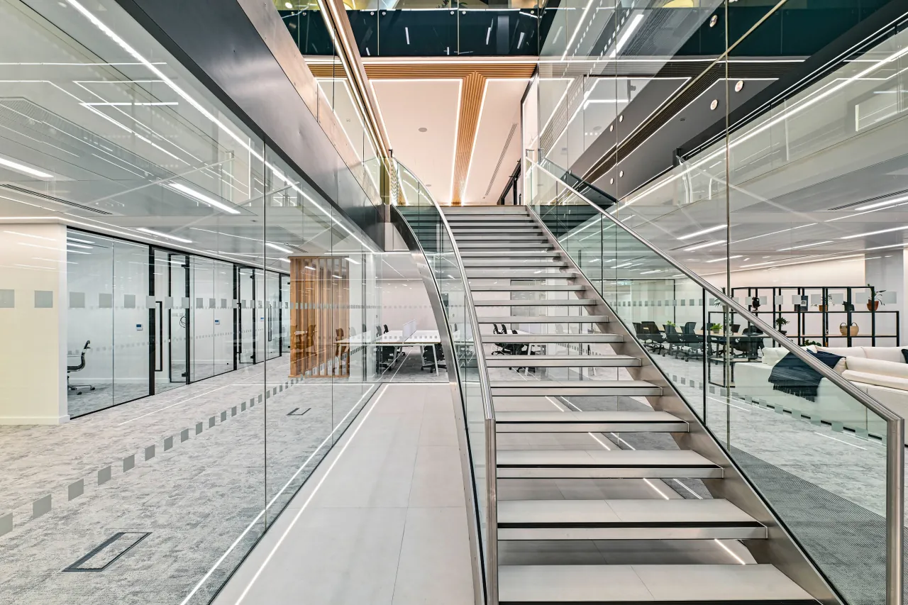The feature staircase and open plan office floors at 10 Old Bailey