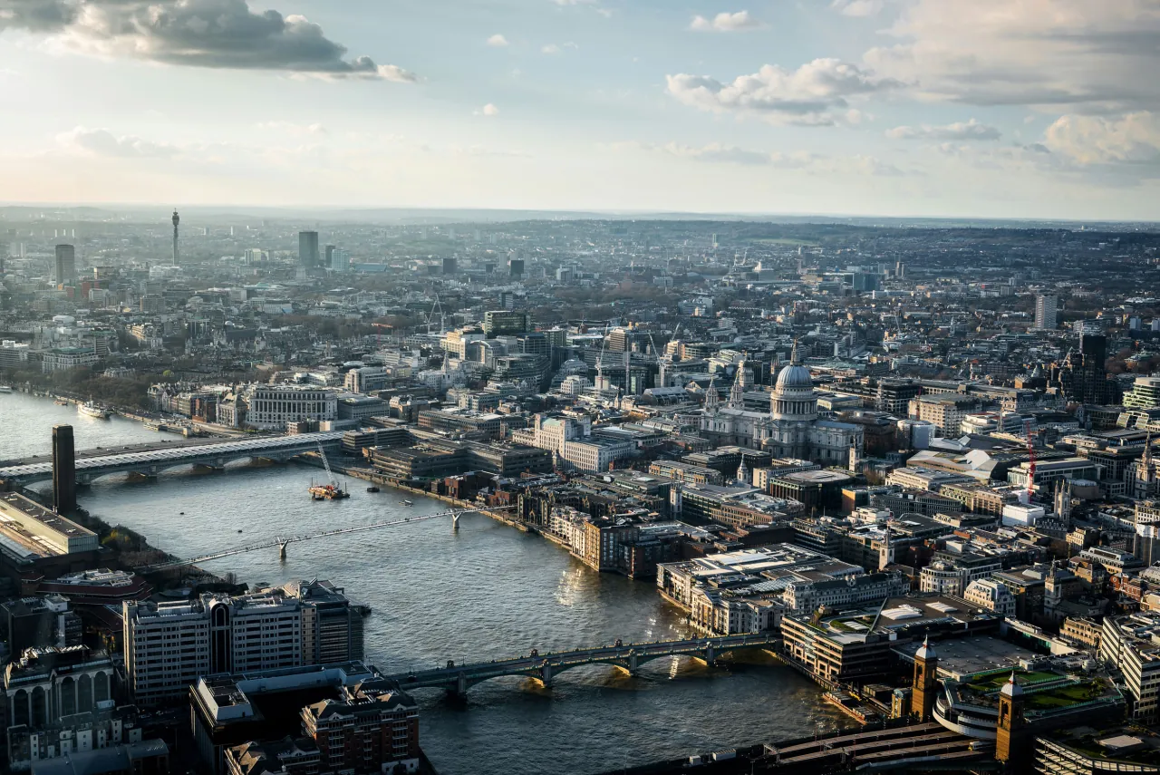 Aerial view over the City of London towards St Paul's Cathedral and the Thames